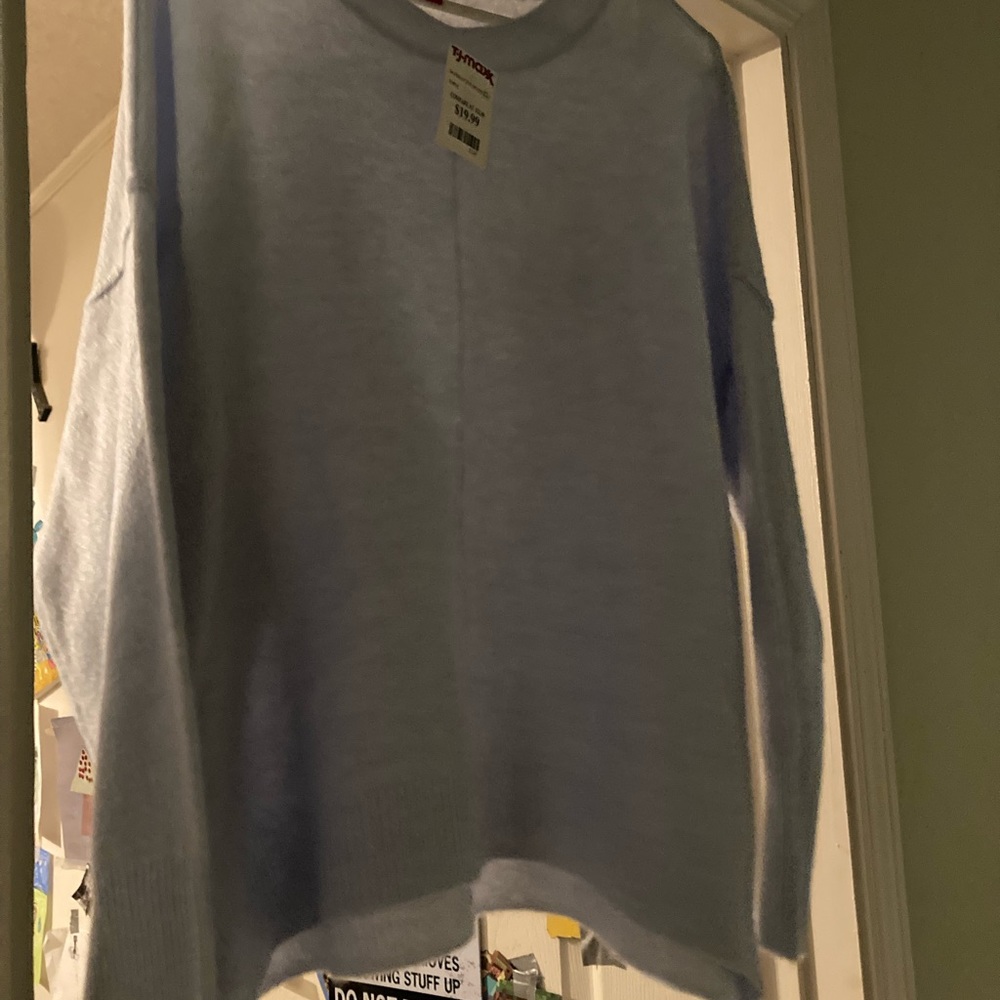 Never worn. Baby blue sweater bought at TJ Maxx